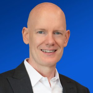 headshot thumbial 1400x1400 blue headshot thumbial 1400x1400 blue